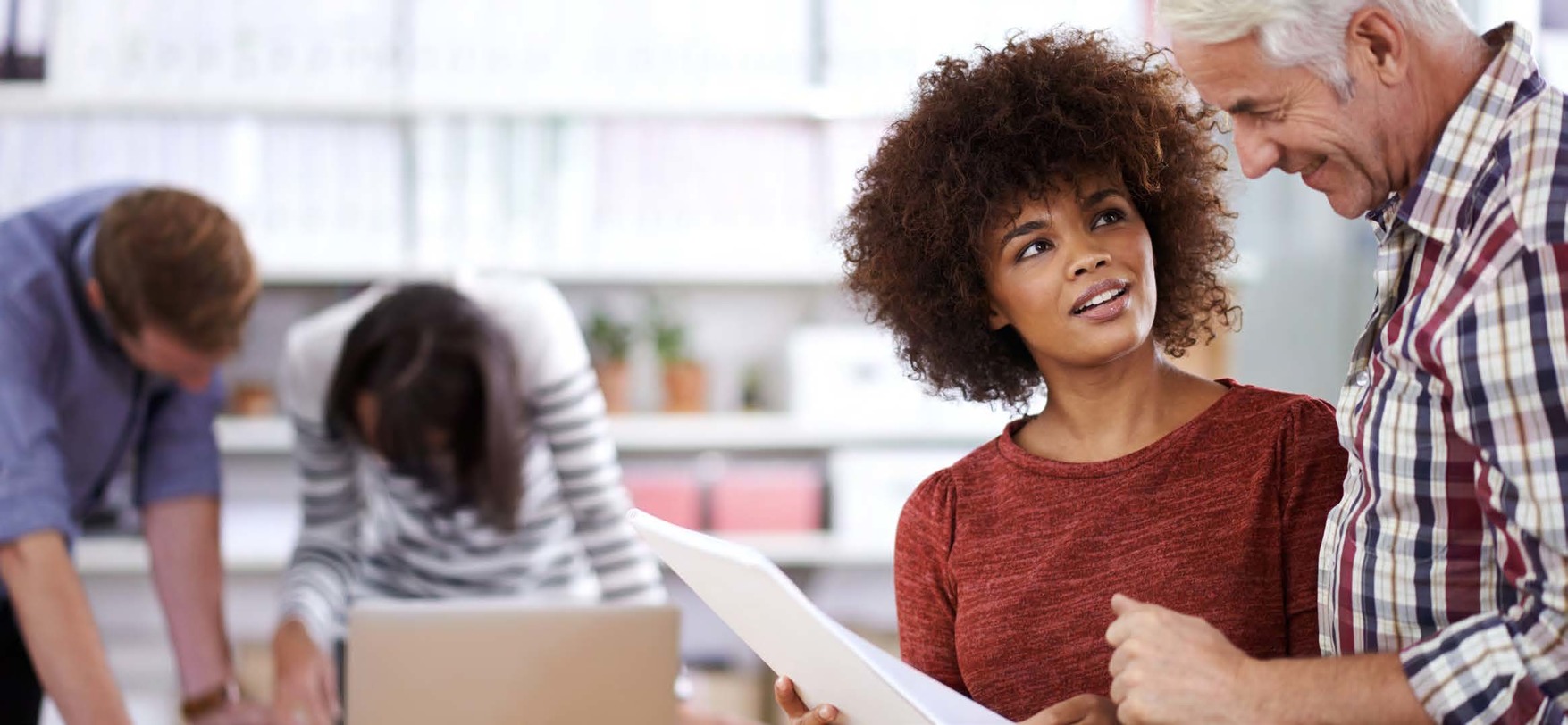 woman talking to fellow employee