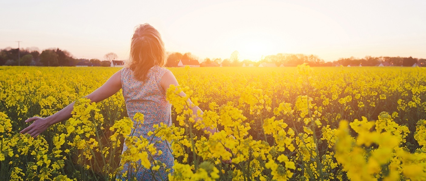 woman in a field of flowers