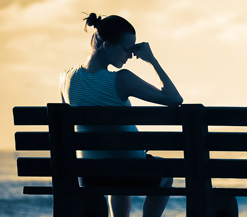 Woman sitting on bench