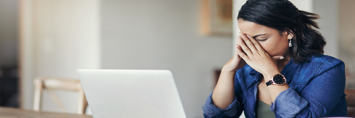 Woman stressed at computer
