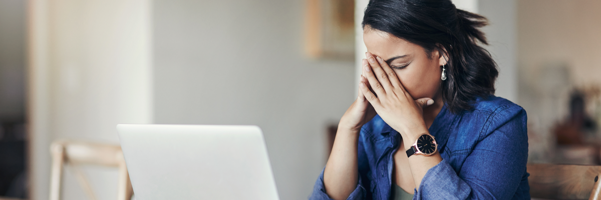 Woman stressed at computer